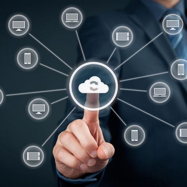 Close up of a person typing on a keyboard to learn more about Carbonite auto backup.